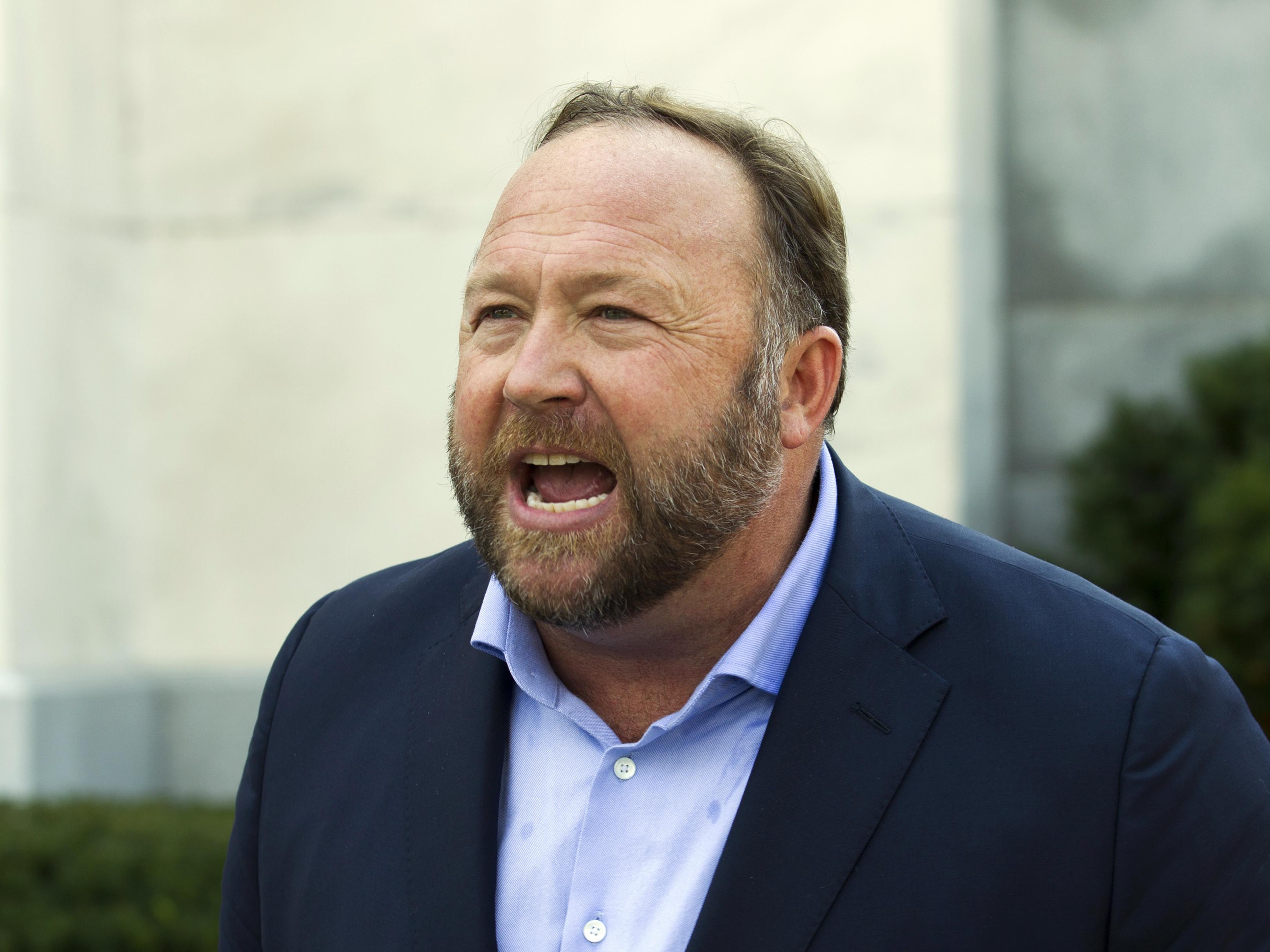 caption: A Connecticut judge has found Alex Jones liable for damages in lawsuits brought by parents of children killed in the Sandy Hook Elementary School shooting.
