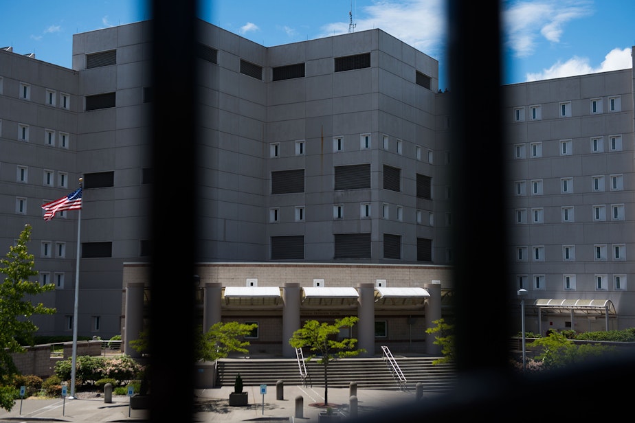 caption: The federal prison at SeaTac where roughly 50 parents separated from their children were initially held.