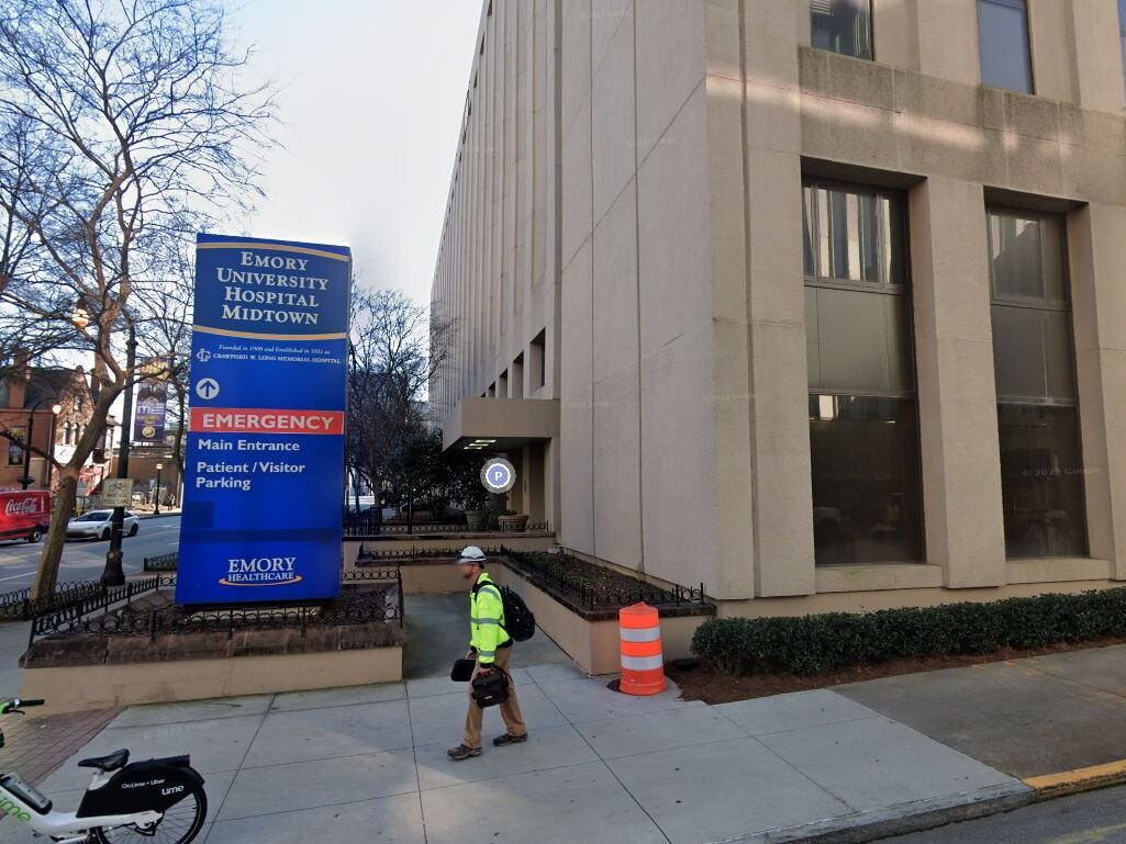 caption: A Georgia couple filed a lawsuit against Emory University Hospital Midtown after they claimed hospital staff misplaced part of the husband's skull following his emergency brain surgery. The outside of the hospital is shown in this Google Maps image.