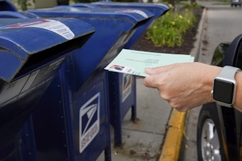 caption: The House passed legislation Saturday to provide $25 billion to the Postal Service to help safeguard voting by mail ahead of the November election.