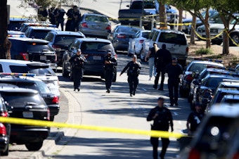caption: Six adults suffered gunshot wounds in the hail of bullets that rained down on the King Estate complex, which houses four different schools Oakland, Calif., on Wednesday.