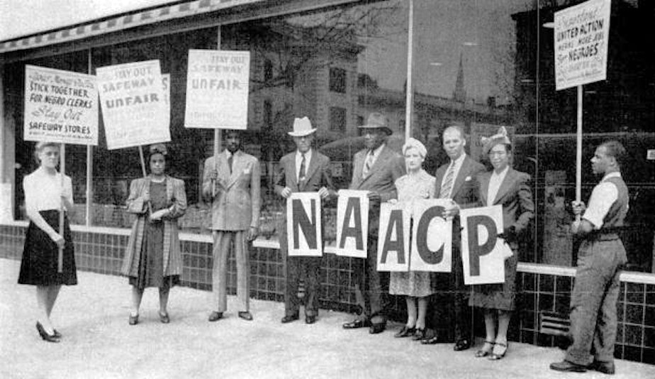 caption: The National Association for the Advancement of Colored People (NAACP) outside a Safeway store in the District of Columbia in 1941, urging consumers to boycott the store until African Americans are hired.