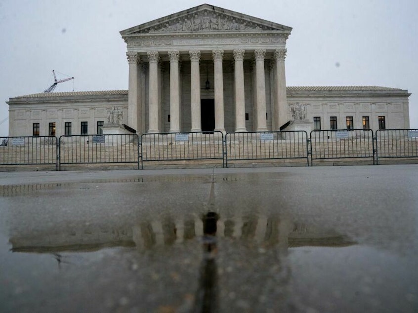 caption: The U.S. Supreme Court is seen in Washington, D.C., on Thursday, the day the court released a report on its investigation into a leaked draft opinion in May 2022.