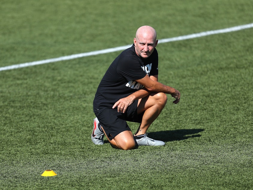 caption: Paul Riley, seen here in July 2020, is among the former NWSL coaches whose behavior is detailed in the investigative report by Sally Q. Yates into abuse in the league.