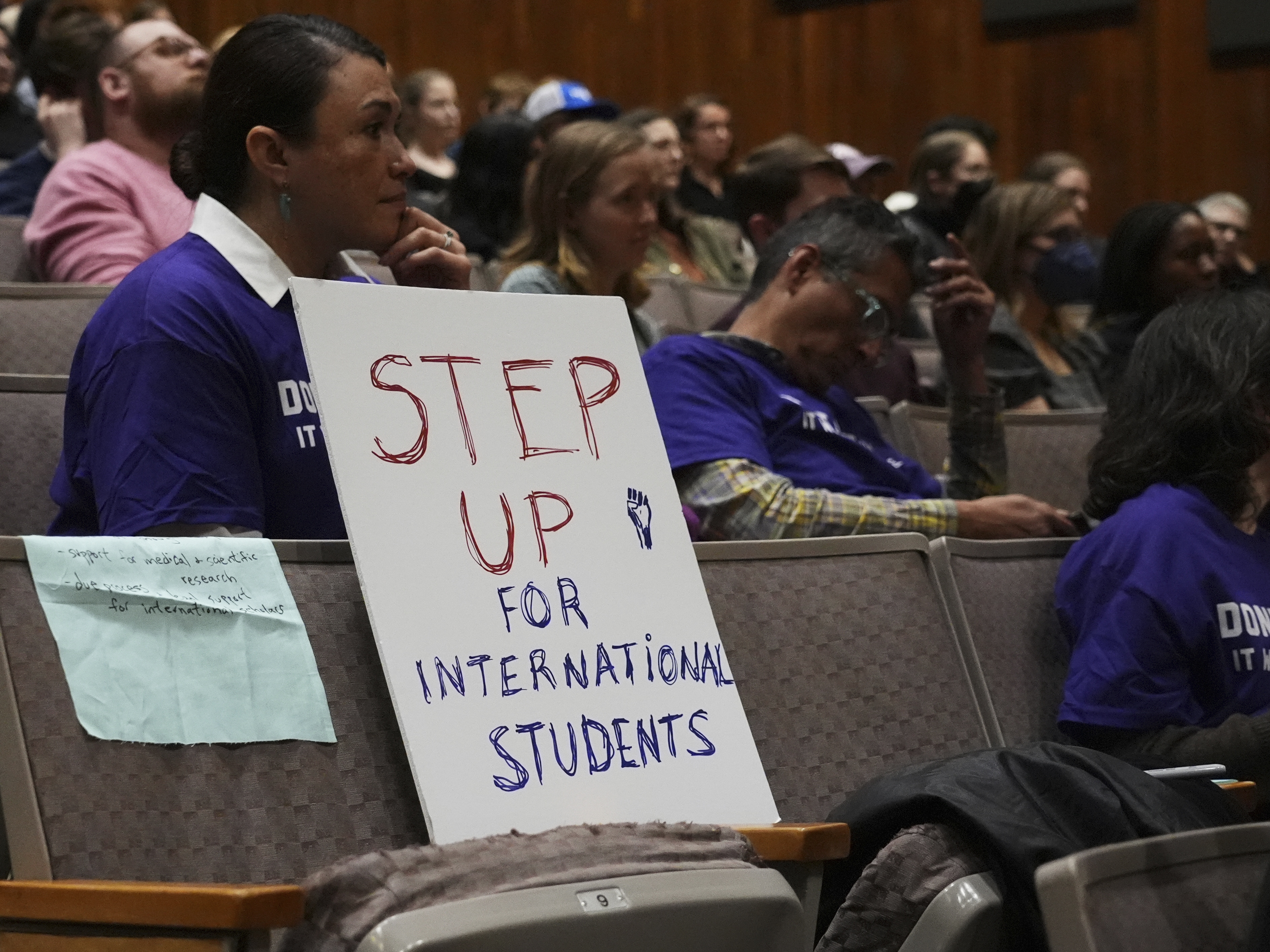 caption: Students and educators attend a rally at Northwestern University one week before the Trump administration said it will restore the records of international students deleted from a crucial database. That move had thrown into doubt many students' ability to stay in the U.S.