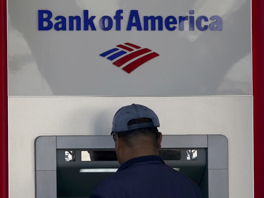 caption: Bank of America, one of the nation's largest banks, is being ordered to pay more than $100 million to customers and $150 million in fines for illegally charging customers for junk fees, fake accounts and withholding rewards.
