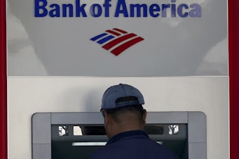 caption: Bank of America, one of the nation's largest banks, is being ordered to pay more than $100 million to customers and $150 million in fines for illegally charging customers for junk fees, fake accounts and withholding rewards.
