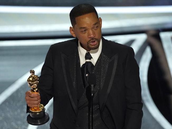 caption: Will Smith cannot attend any Academy events or programs after slapping Chris Rock.