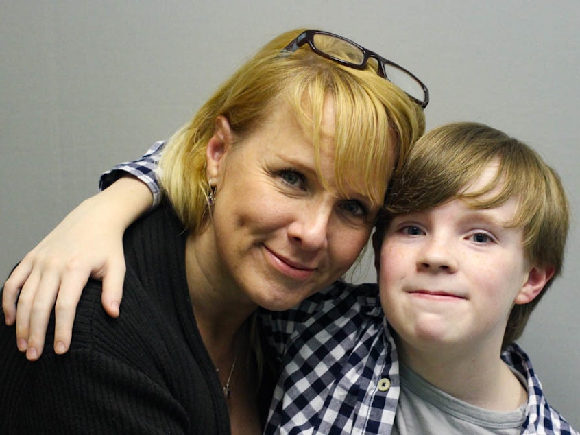 caption: Jennifer Sumner and her son, Kaysen Ford, embrace at their StoryCorps interview in 2015 in Birmingham, Ala.