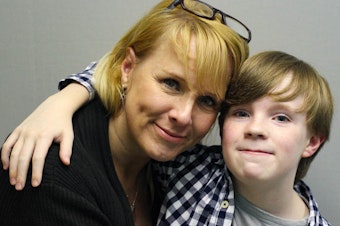 caption: Jennifer Sumner and her son, Kaysen Ford, embrace at their StoryCorps interview in 2015 in Birmingham, Ala.