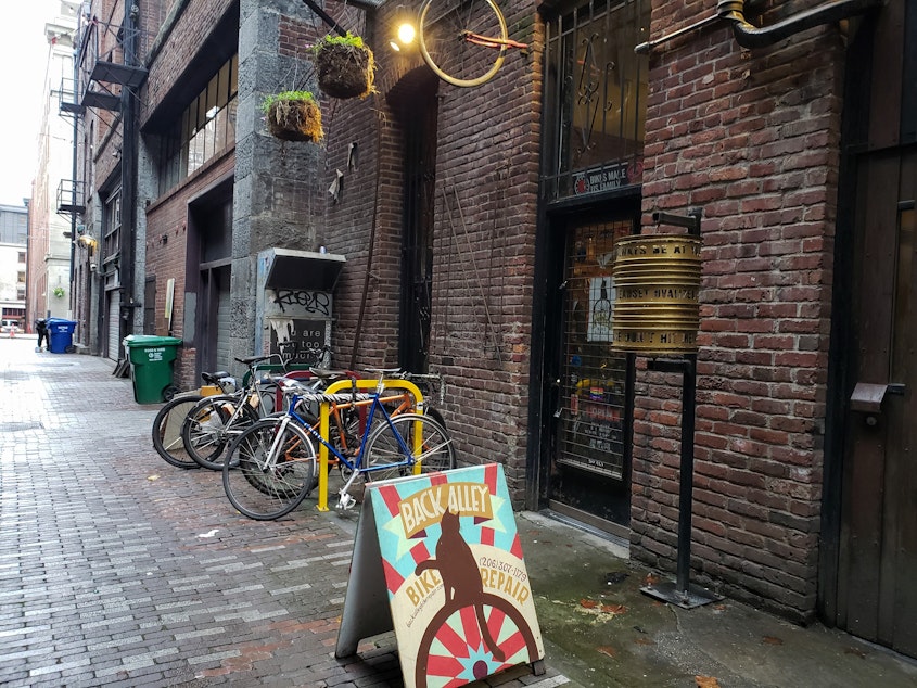 caption: Ben Rainbow, owner of Back Alley Bike Repair, says this past summer was the worst yet in crime. Rainbow said Pioneer Square "got absolutely clobbered" on Monday, October 22, 2019.