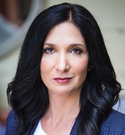 caption: Author Nomi Prins