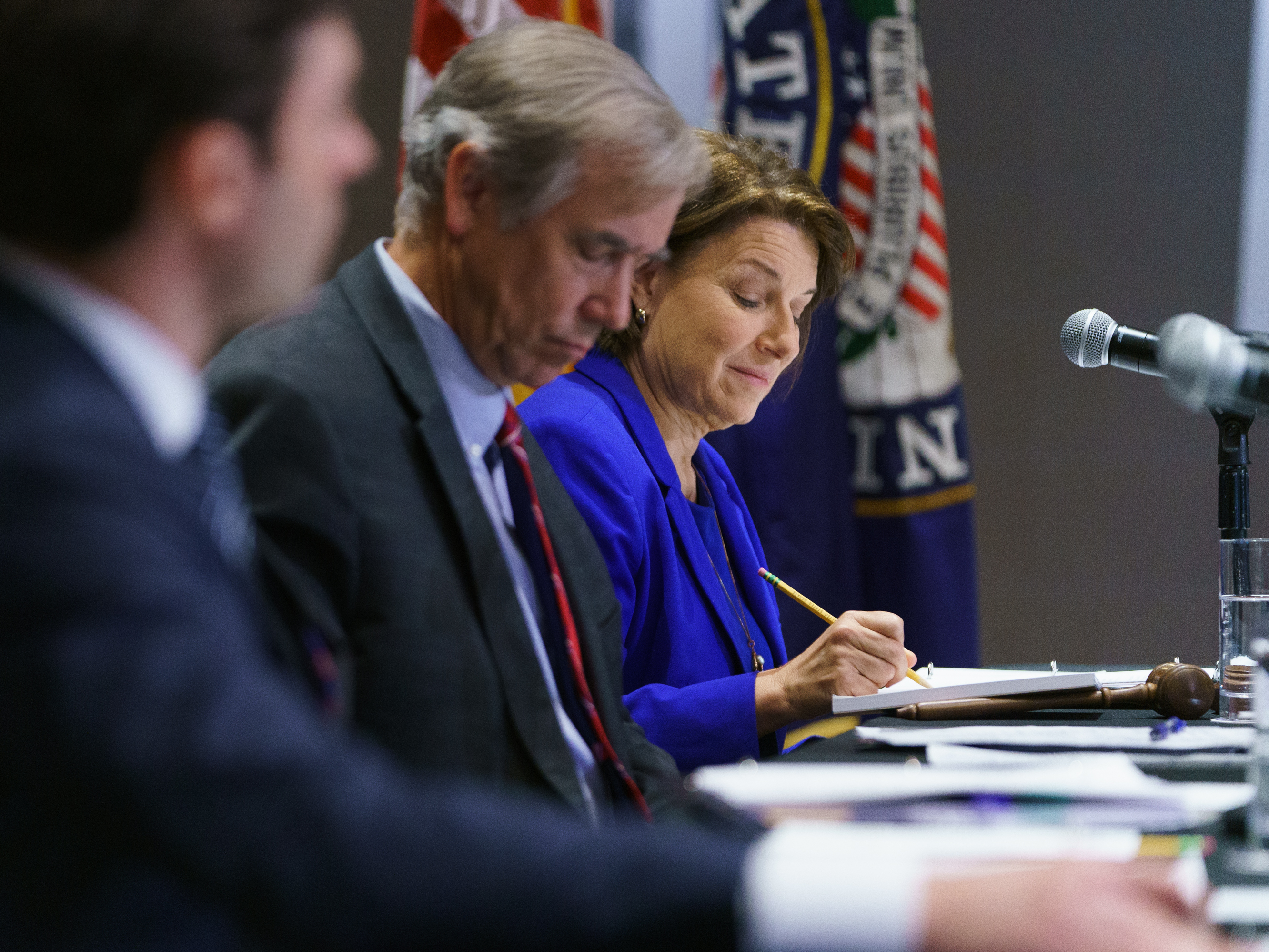 caption: Sen. Amy Klobuchar, D-Minn., takes notes during a Senate Rules Committee field hearing on July 19 in Atlanta on the issue of voting rights. Klobuchar and several other Democratic senators have unveiled new voting legislation.