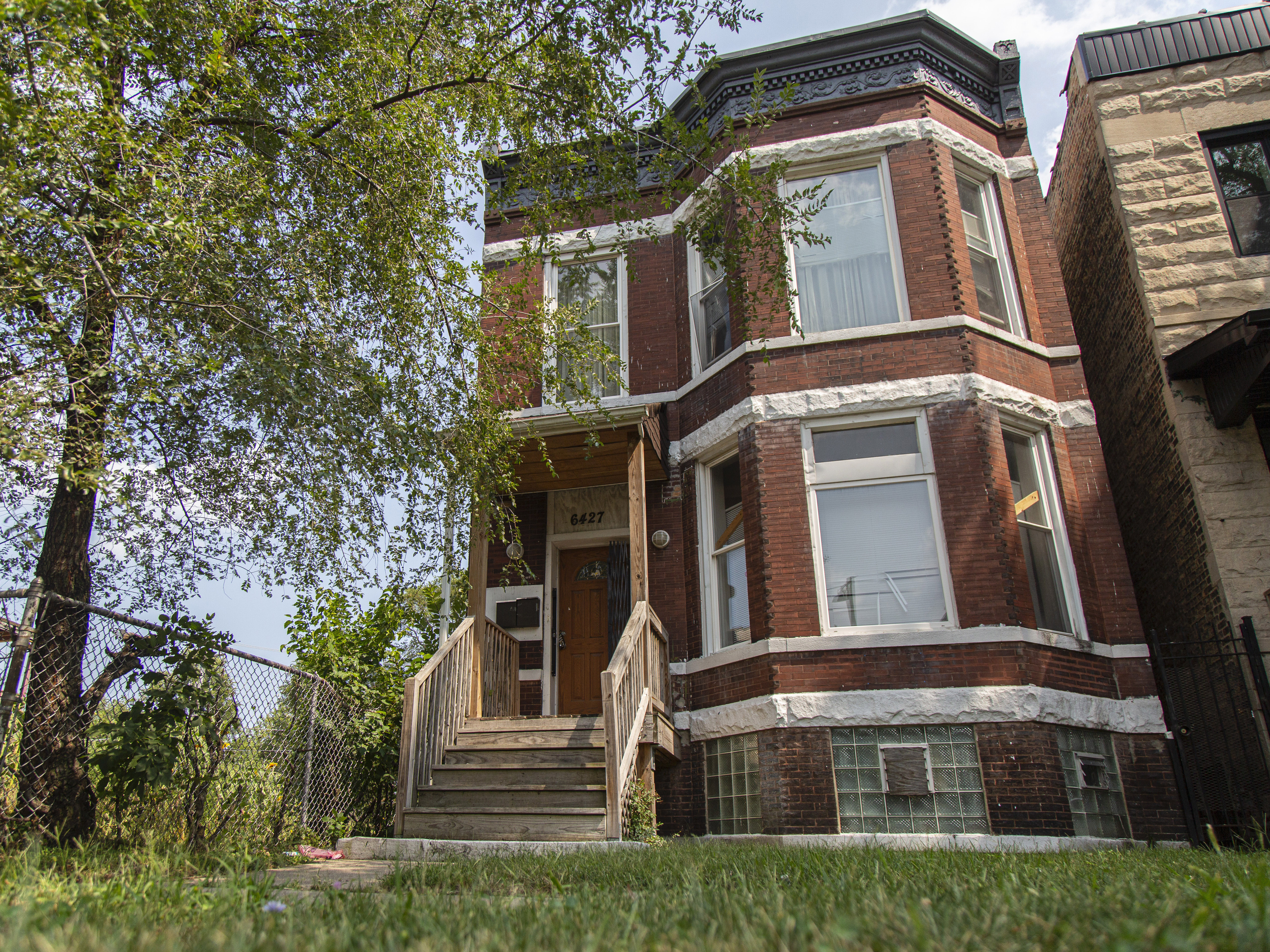 caption: The former home of Emmett and Mamie Till is pictured in the West Woodlawn neighborhood of Chicago on Aug. 26, 2020. It is one of more than two dozen historically significant sites that will share in $3 million grant money from a preservation organization.