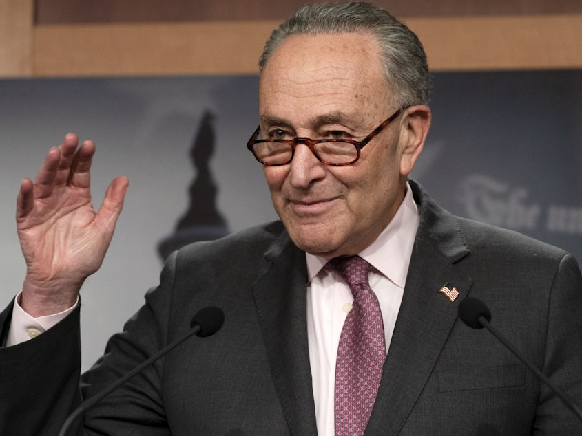 caption: Senate Majority Leader Chuck Schumer, D-N.Y., is working to keep both moderates and progressives inside his caucus on board with the $1.9 trillion coronavirus relief bill and pass it this week.