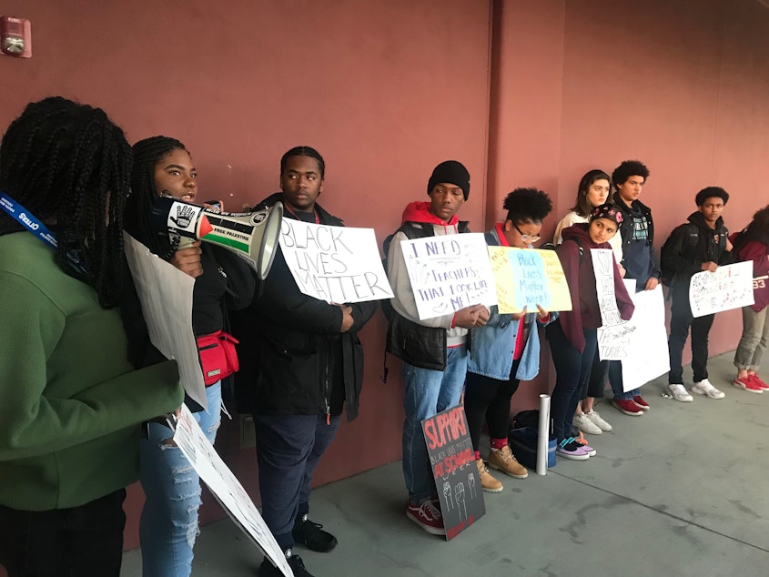 caption: Members of the NAACP Youth Coalition rally outside the Seattle School Board meeting at the district headquarters during Black Lives Matter at School Week, February 9, 2019