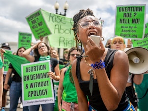 caption: Abortion rights supporters demonstrate outside the U.S. Supreme Court on June 24, 2022, in response to its decision in <em>Dobbs v. Jackson Women's Health Organization</em>.