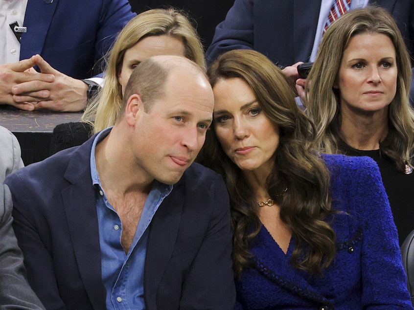 caption: Britain's Prince William and Kate, Princess of Wales, watch an NBA basketball game between the Boston Celtics and the Miami Heat on Wednesday in Boston.