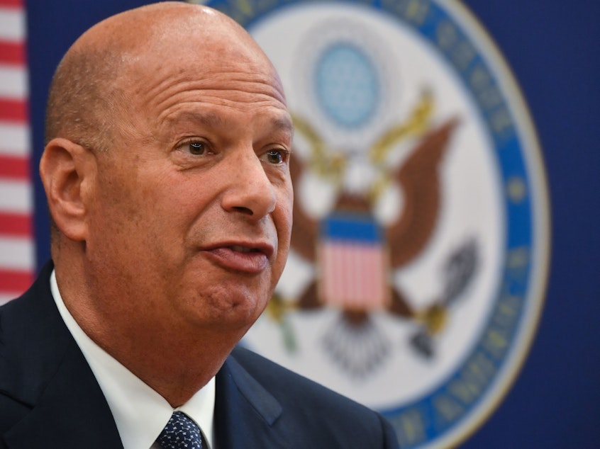 caption: Gordon Sondland, the United States ambassador to the European Union, addresses the media during a press conference at the U.S. Embassy to Romania in Bucharest in September. Sondland is speaking to House investigators on Thursday.