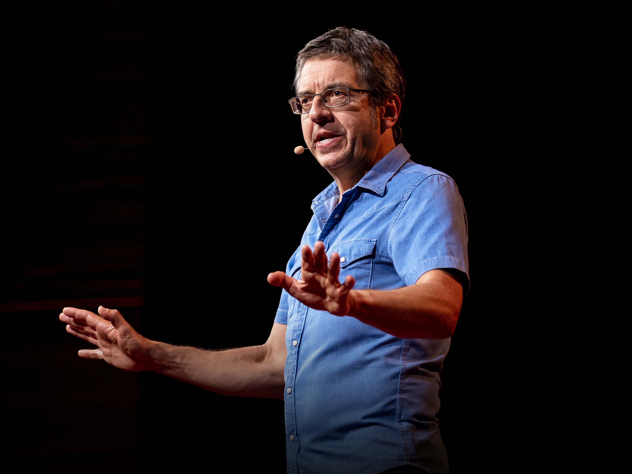 caption: George Monbiot speaks at TEDSummit: A Community Beyond Borders.
