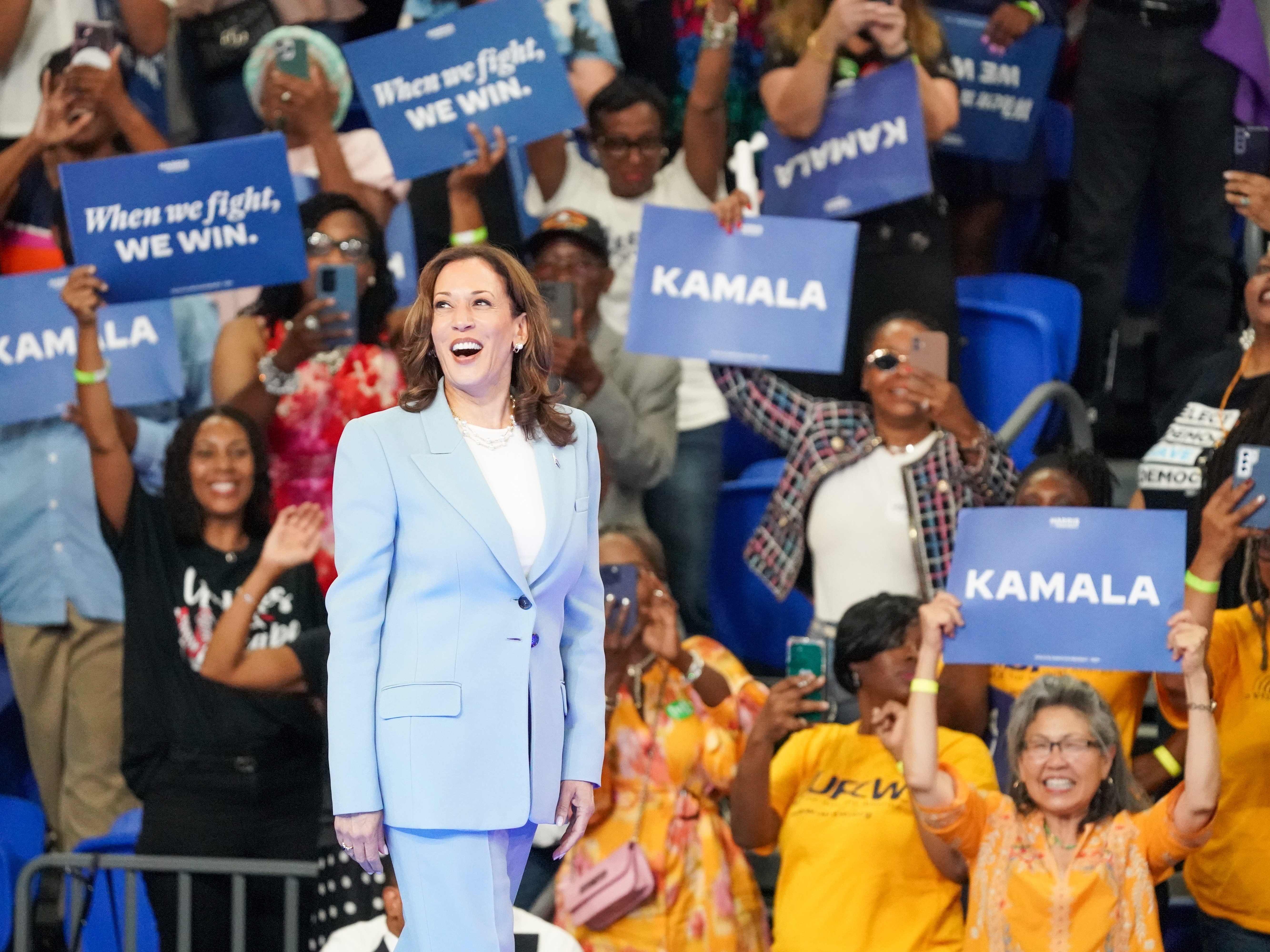 caption: Democratic presidential candidate, Vice President Kamala Harris arrives at her campaign rally at the Georgia State Convocation Center on July 30 in Atlanta. 