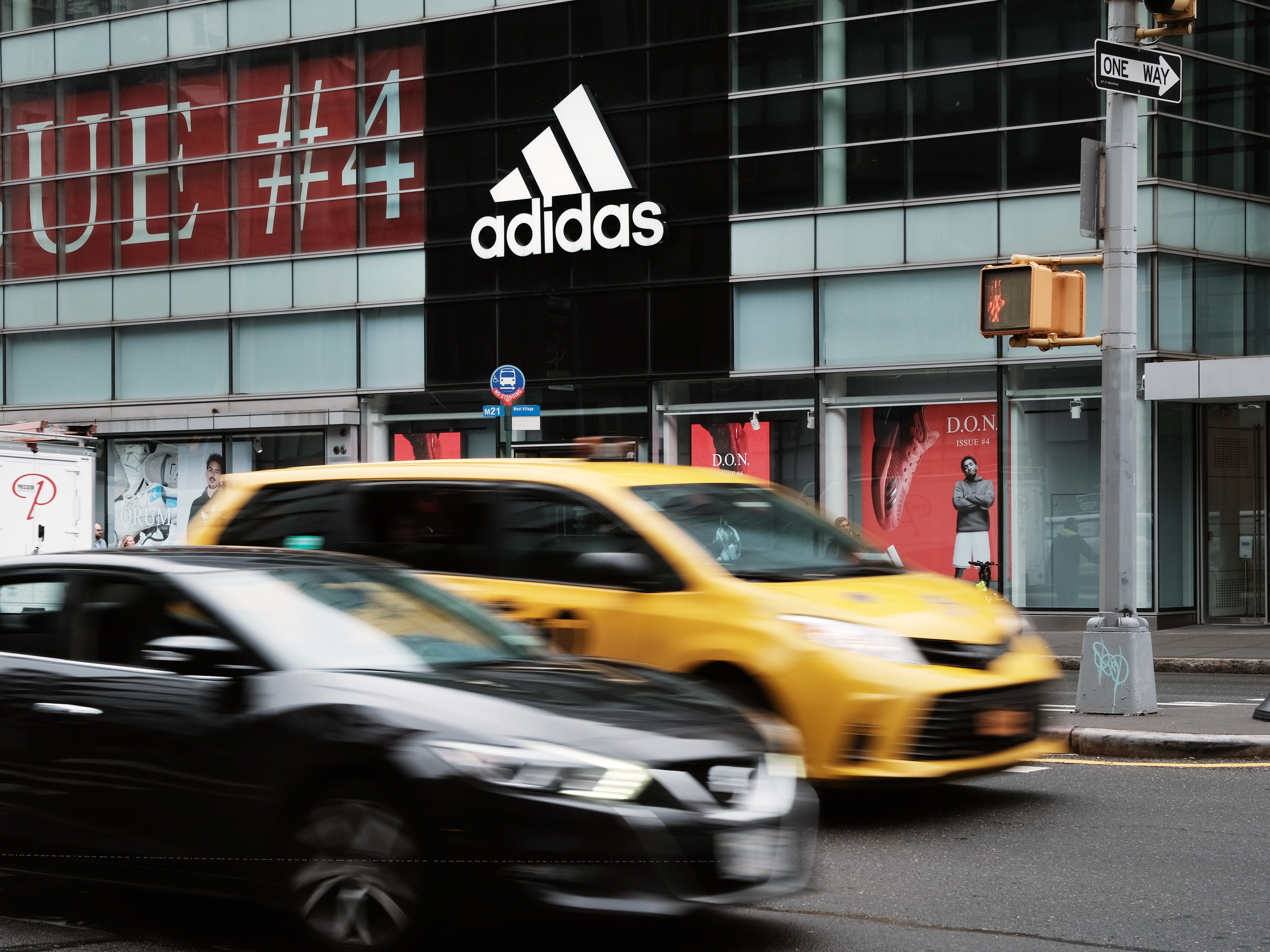caption: An Adidas store stands in Manhattan on October 25, 2022, in New York City. The company is facing big losses after terminating its relationship with Kanye West.