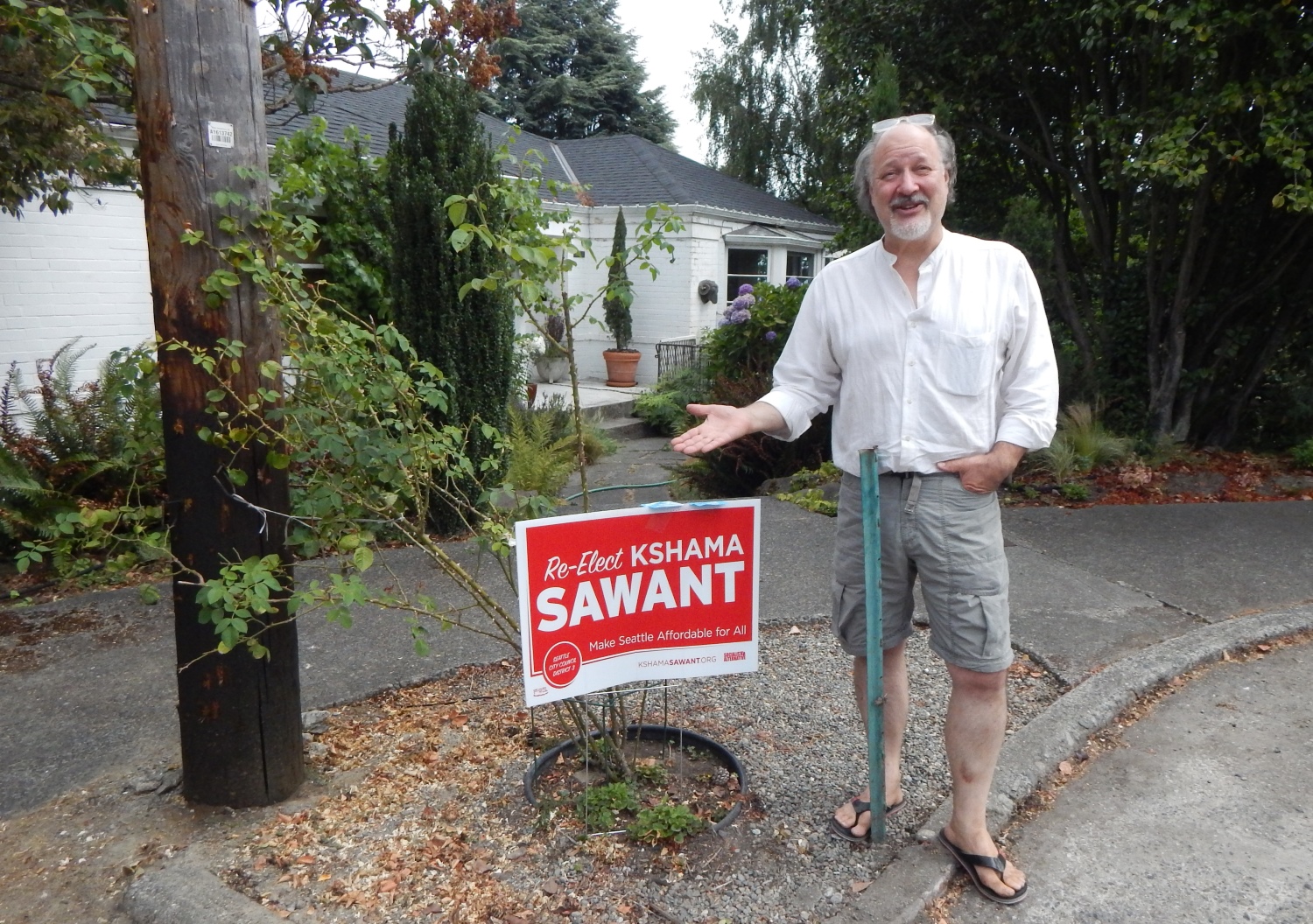 caption: Lauris Bitners, a North Capitol Hill resident who had a sign stolen from in front of his house,  is fighting back using a GoPro camera.
