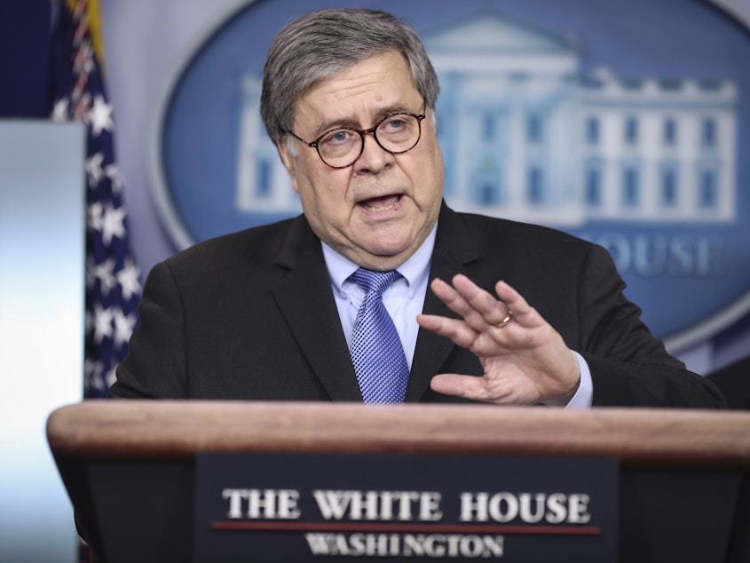 caption: Attorney General William Barr speaks during a coronavirus task force news conference at the White House earlier this month.