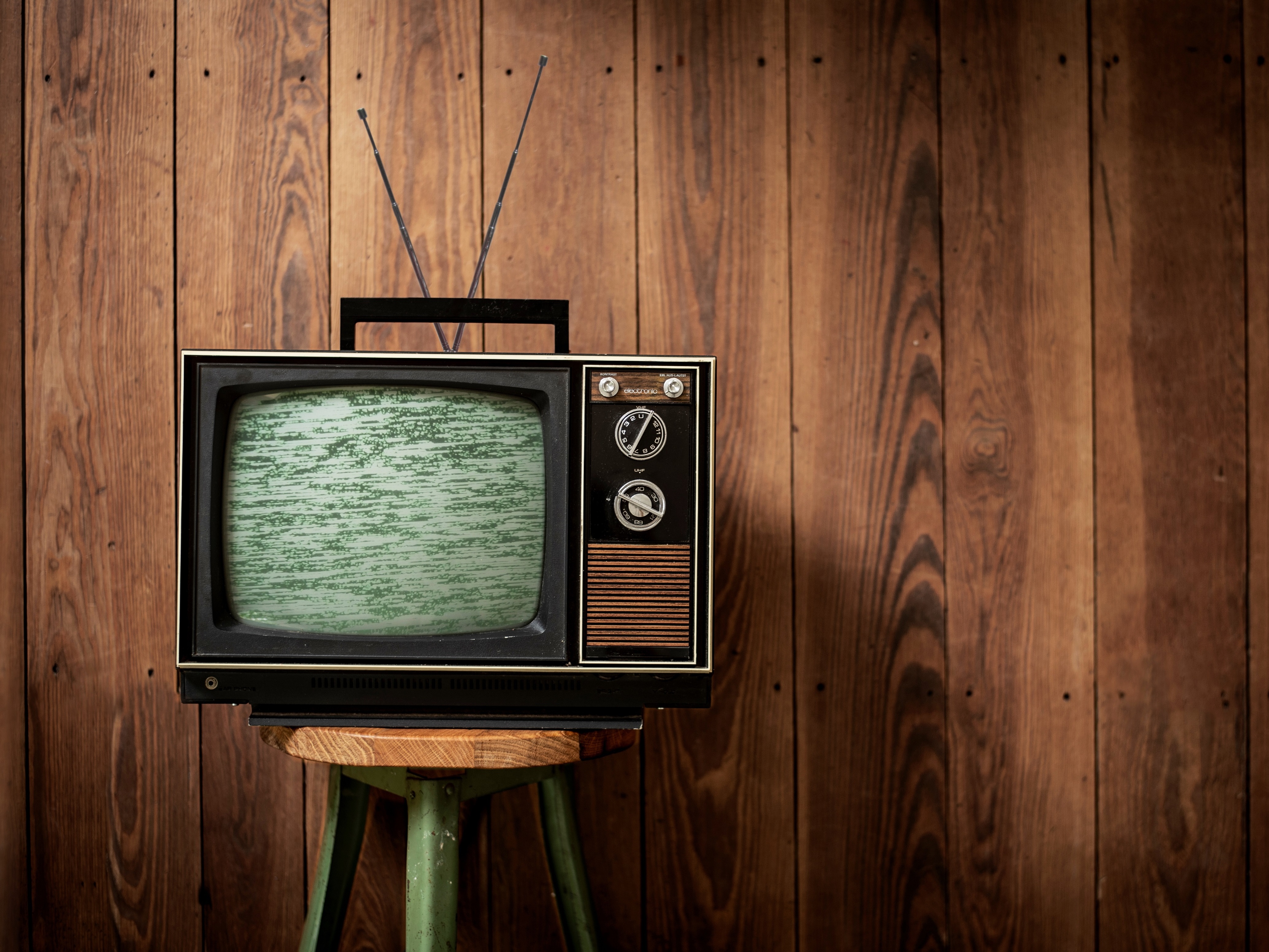 caption: People are watching more TV and adding new streaming services to cope with isolation — but statistics show they're tending to re-watch old favorites.