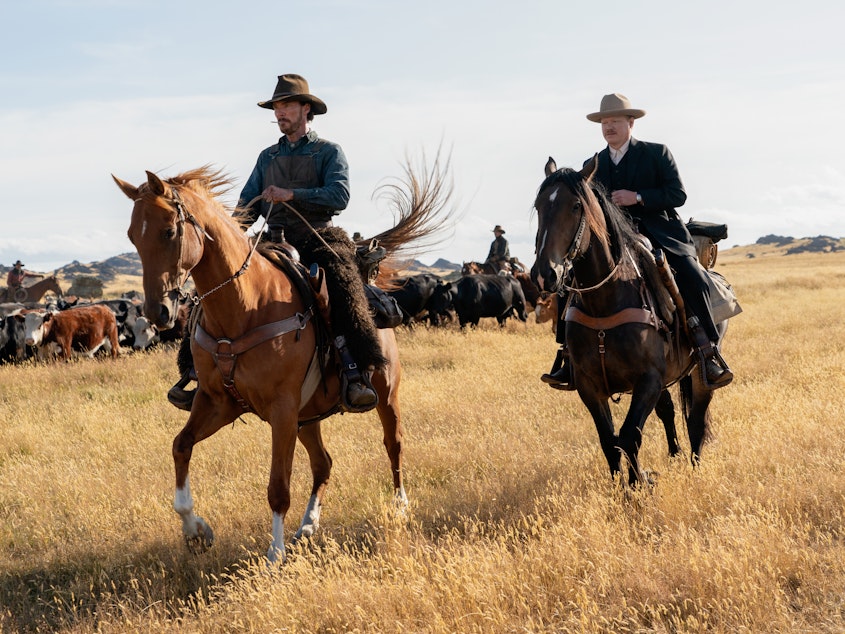 caption: Benedict Cumberbatch and Jesse Plemons in <em>The Power of the Dog. </em>Both actors are up for Oscars this year.