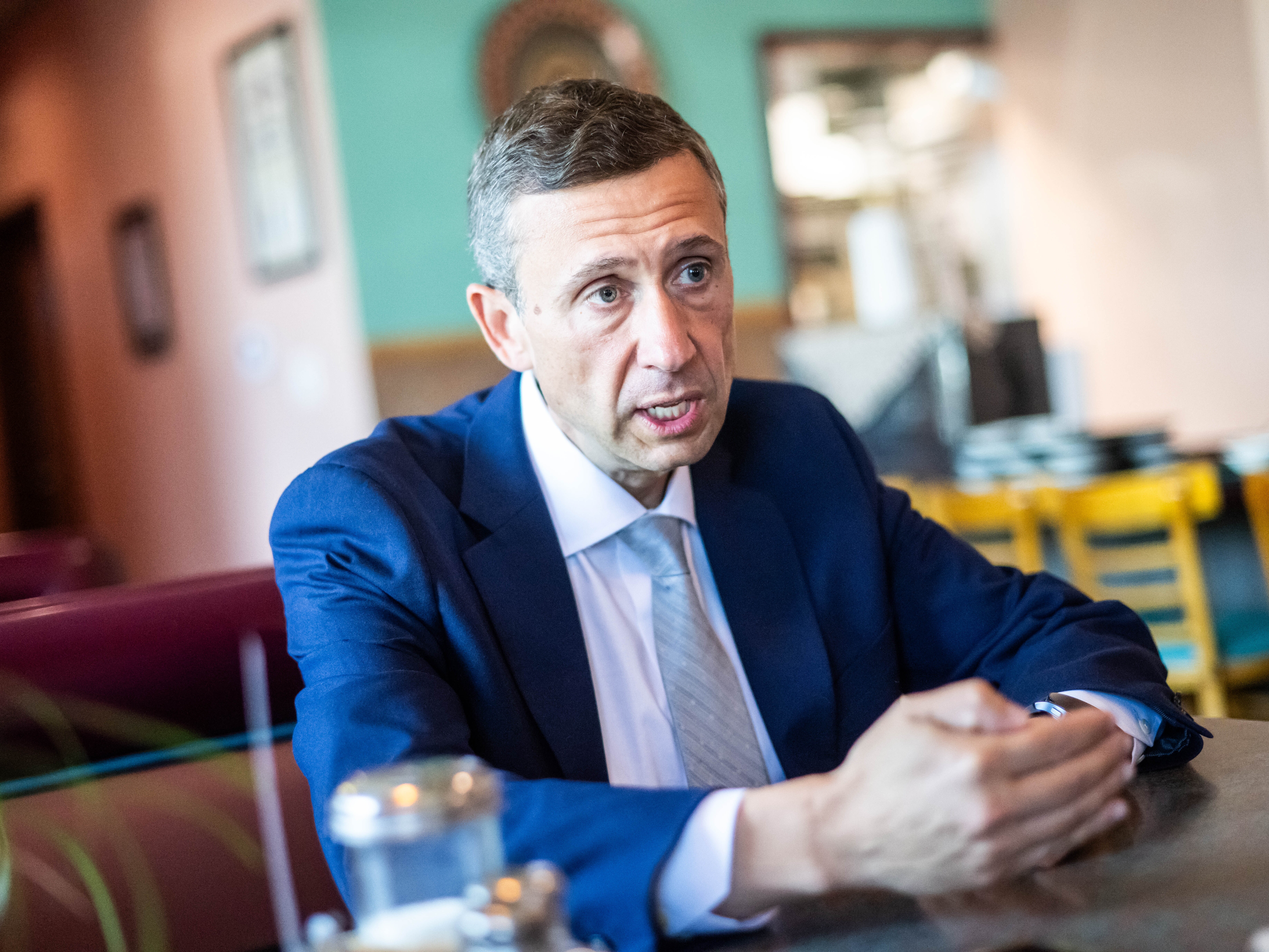 caption: Democratic National Committee Chair Ken Martin talks about the economy and immigration in East Los Angeles on July 30.
