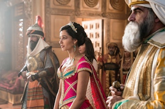 caption: Naomi Scott plays Jasmine in the new live-action <em>Aladdin</em> movie. The character was the first official Disney princess of color in the 1992 animated version of the film.