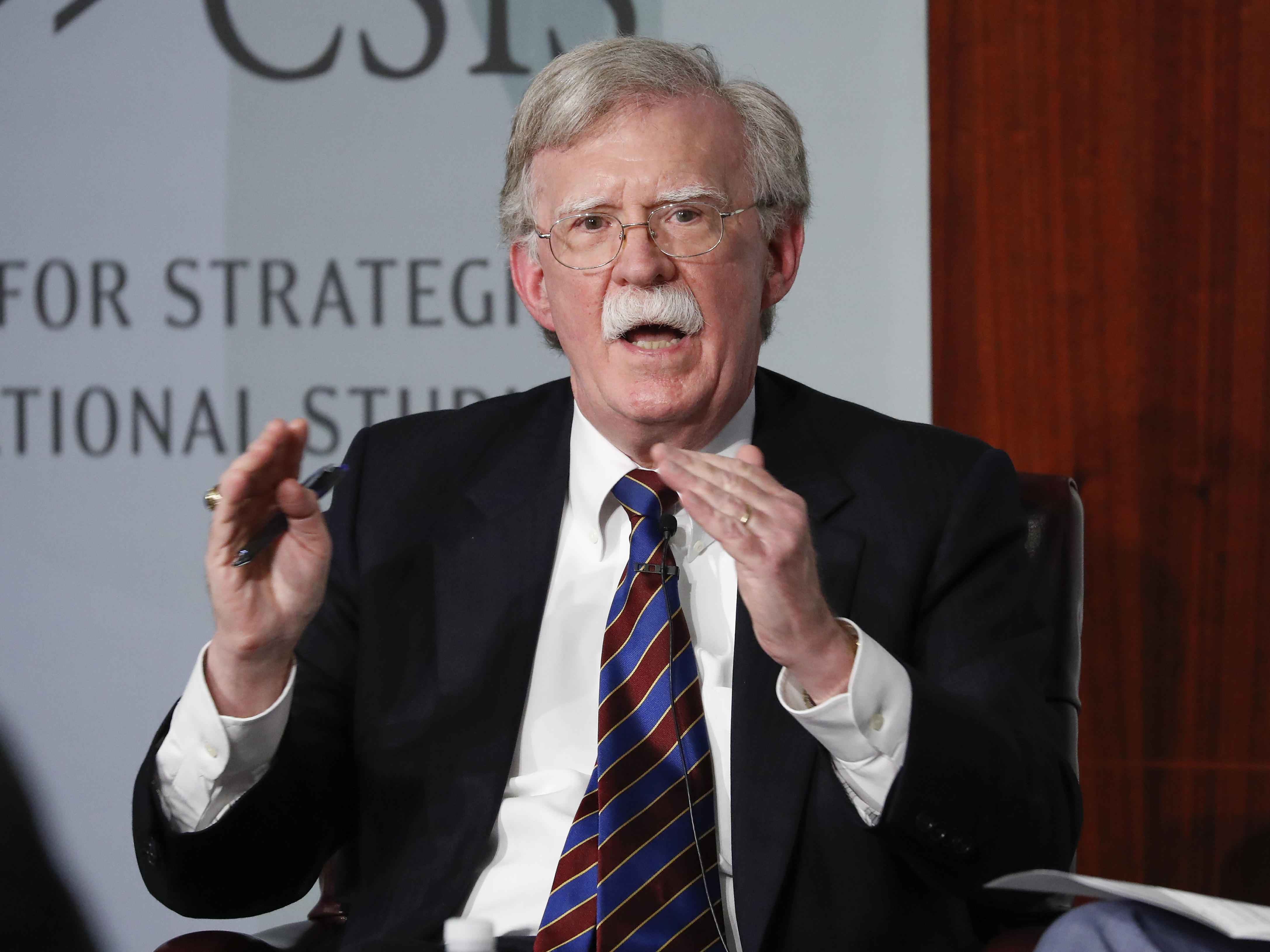 caption: Former National Security Adviser John Bolton speaks at the Center for Strategic and International Studies in Washington on Sept. 30, 2019.
