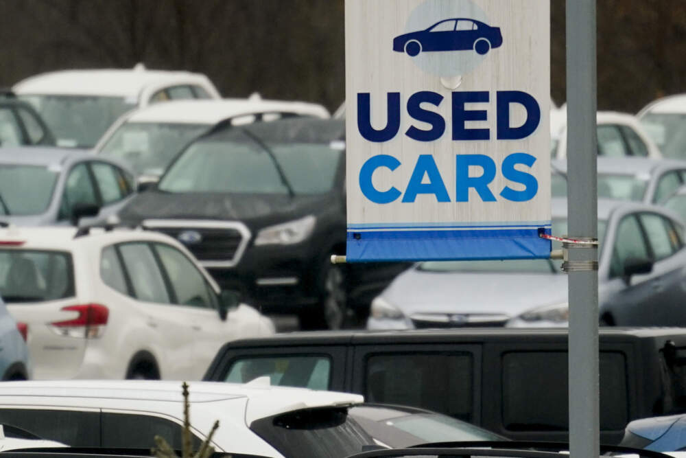 caption: Used cars for sale on a lot at a dealership. (Matt Rourke/AP)