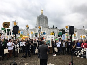 caption: <p>Hundreds of people protest in favor of cap-and-trade legislation at the Oregon Capitol in Salem, Oregon, Wednesday, Feb. 6, 2019. The bill&nbsp;aims to limit carbon emissions.</p>