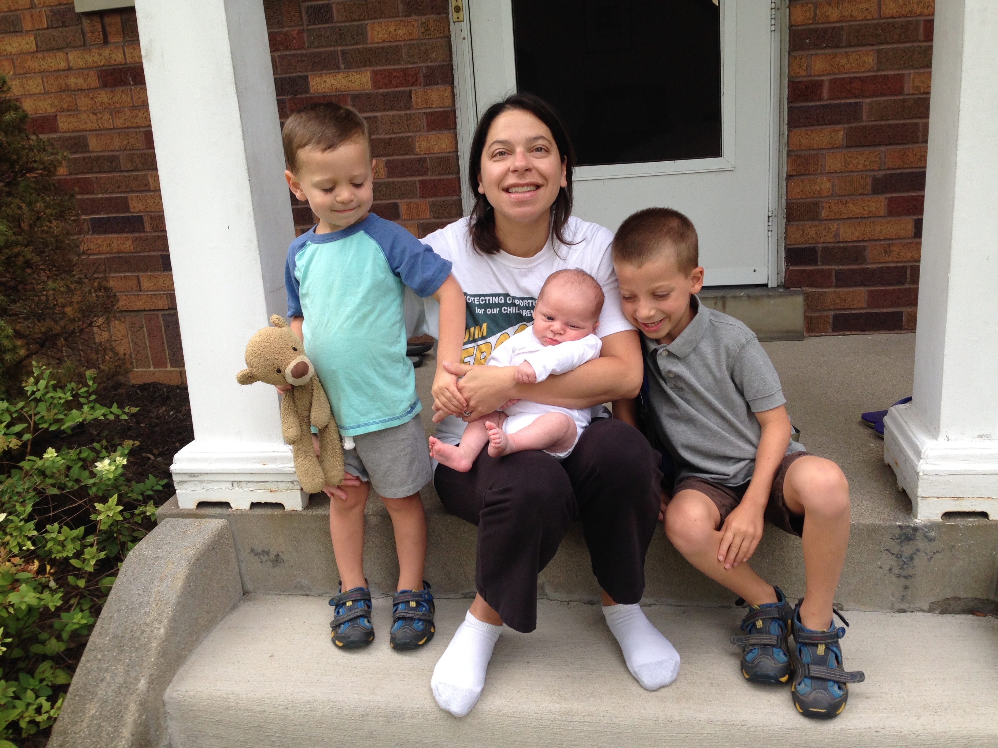 caption: Emma Carlson Berne with her young family.
