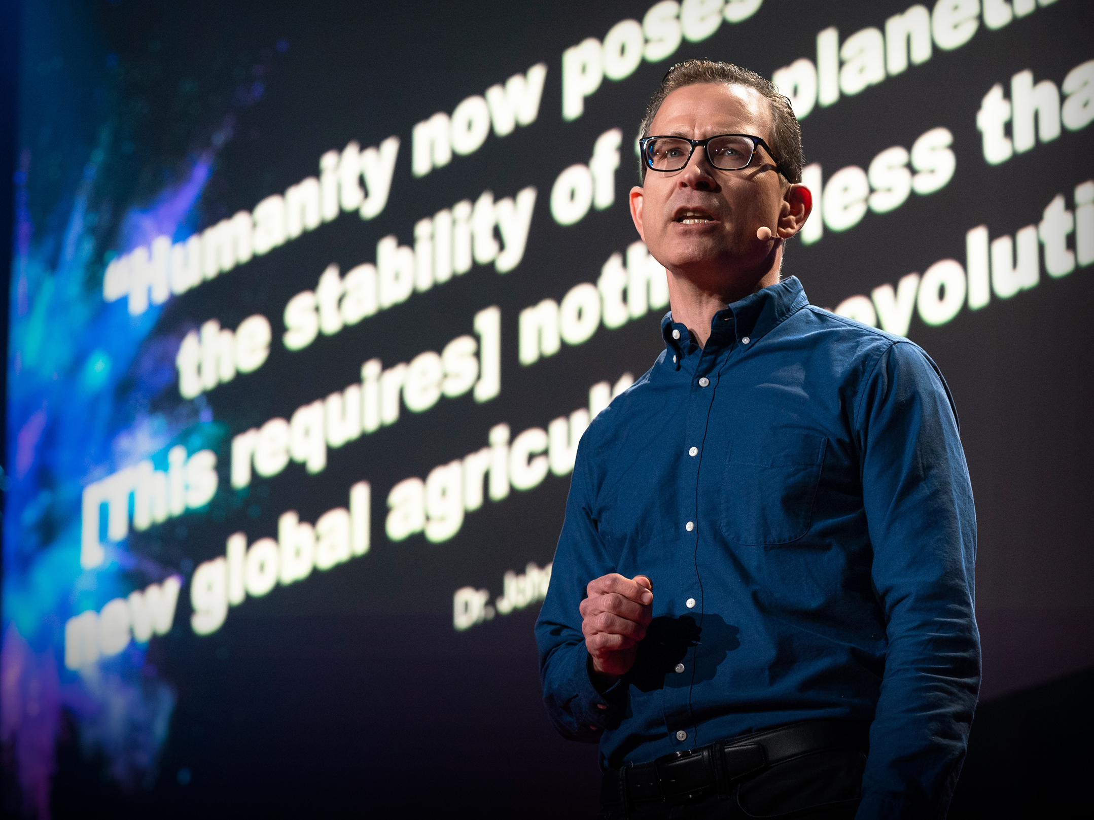 caption: Bruce Friedrich on the TED Stage.