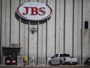 caption: The big meatpacker JBS faced a ransomware attack in early June. JBS paid a ransom of $11 million to cyberattackers.