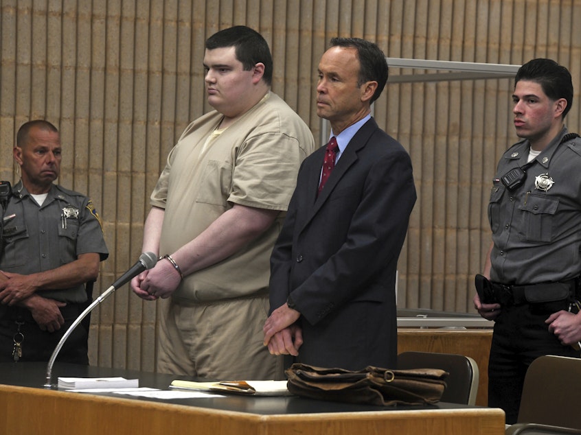 caption: Peter Manfredonia was sentenced to 55 years in prison for killing two people, injuring another, holding a man hostage and kidnapping a woman in 2020.