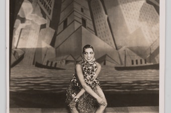 caption: Josephine Baker performs the Charleston onstage at Folies Bergère, circa 1926-1935.