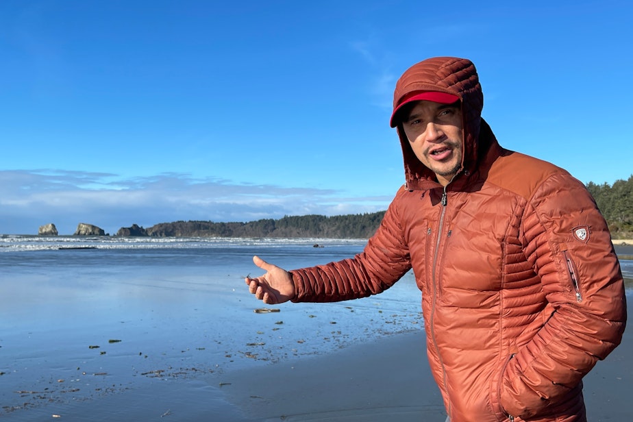caption: Quinault Tribal Councilmember and razor-clam digger Ryan Hendricks on a Quinault Reservation beach on Jan. 12, 2024.