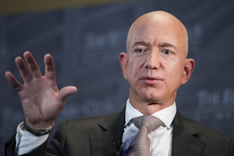caption: In this Sept. 13, 2018, file photo Jeff Bezos, Amazon founder and CEO, speaks at The Economic Club of Washington's Milestone Celebration in Washington.
