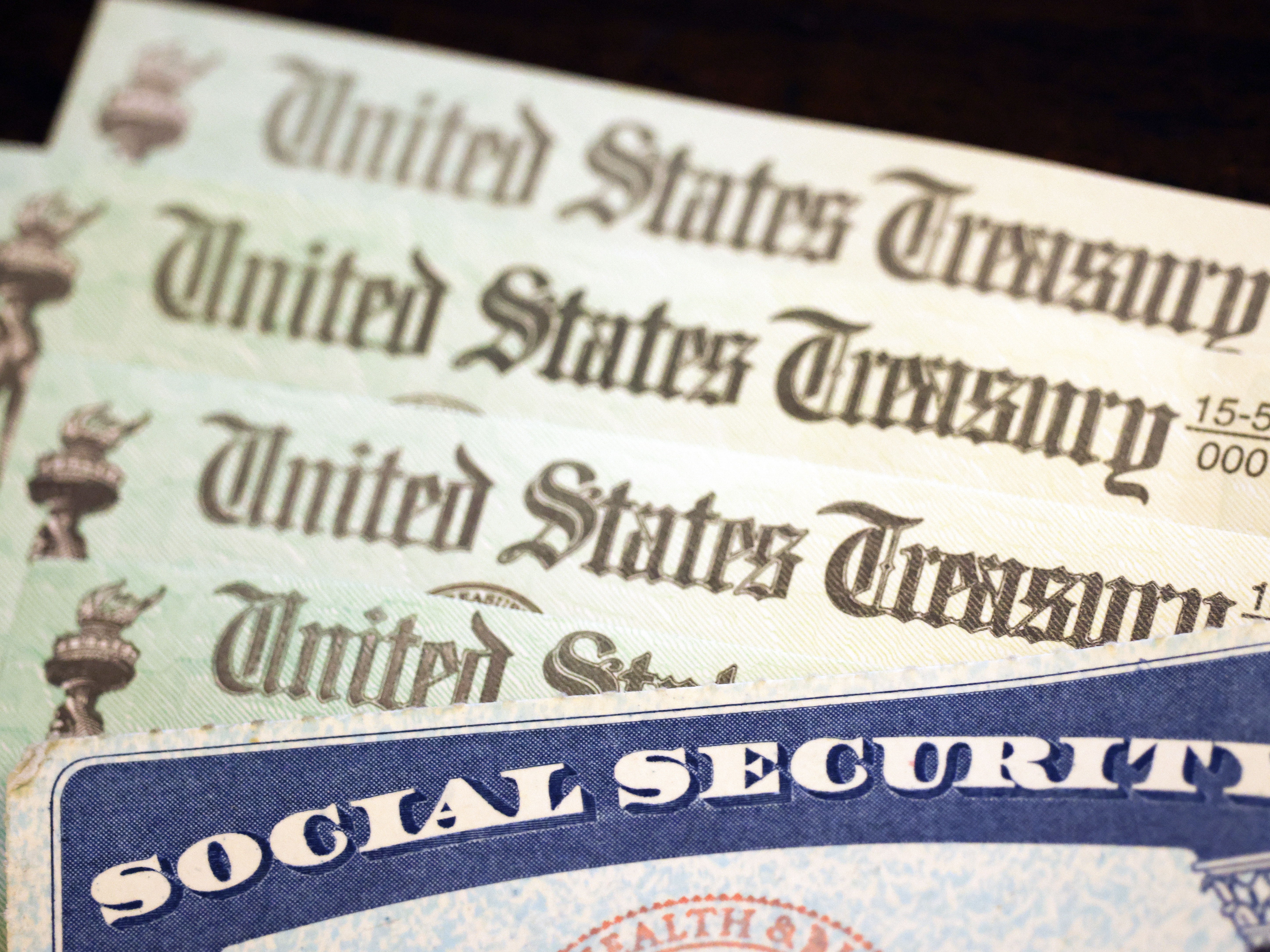 caption: An annual update from Social Security says the safety net program's trust fund will run out of cash in eight years. After that, payroll taxes will cover only about 77% of expected benefits.