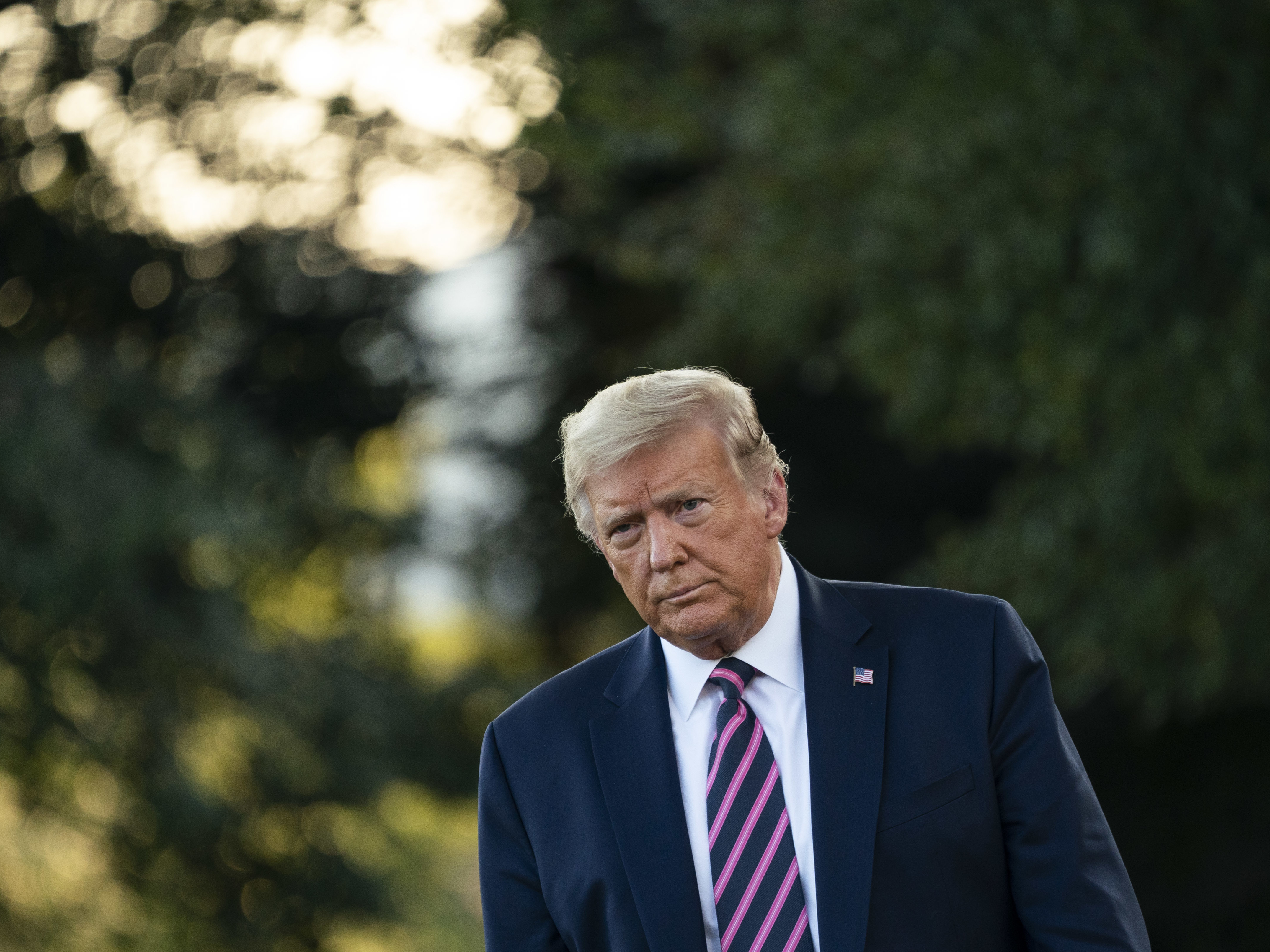 caption: President Trump, pictured on the South Lawn of the White House on Tuesday, signed an executive order on certain training about race for federal contractors, expanding an earlier ban on federal employees.