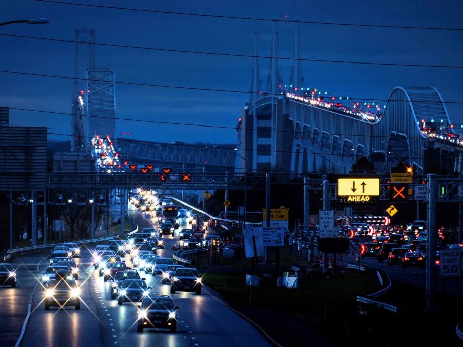 caption: Cars cross the Bay Bridge over the Chesapeake Bay in Stevensville, Md., on Nov. 22, 2023, ahead of the Thanksgiving holiday.