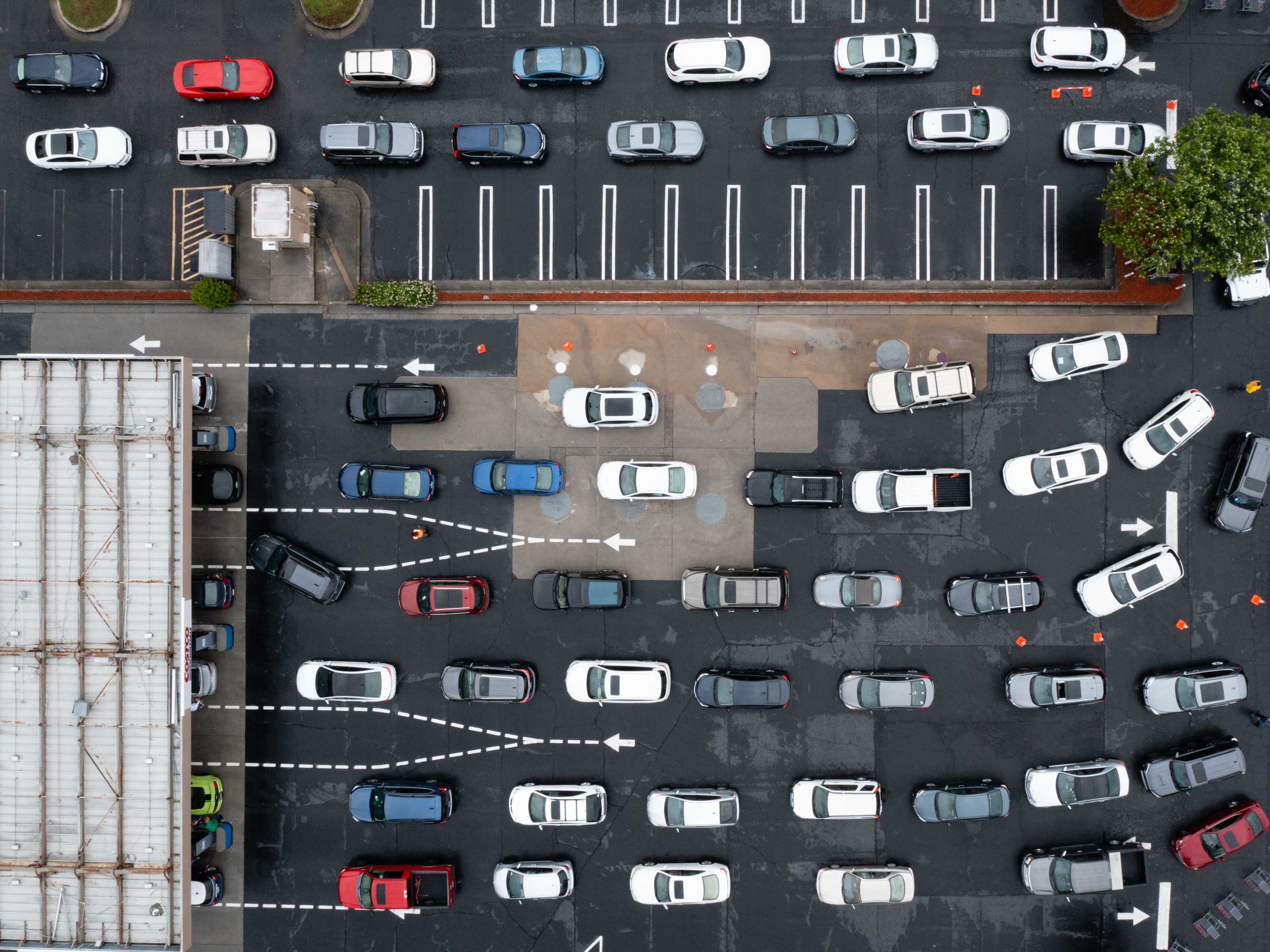 caption: Drivers wait to refuel vehicles Wednesday at a Costco Wholesale Corp. gas station in Dunwoody, Ga. Officials are urging people not to panic-buy as motorists in Southeastern states put a run on gas stations.