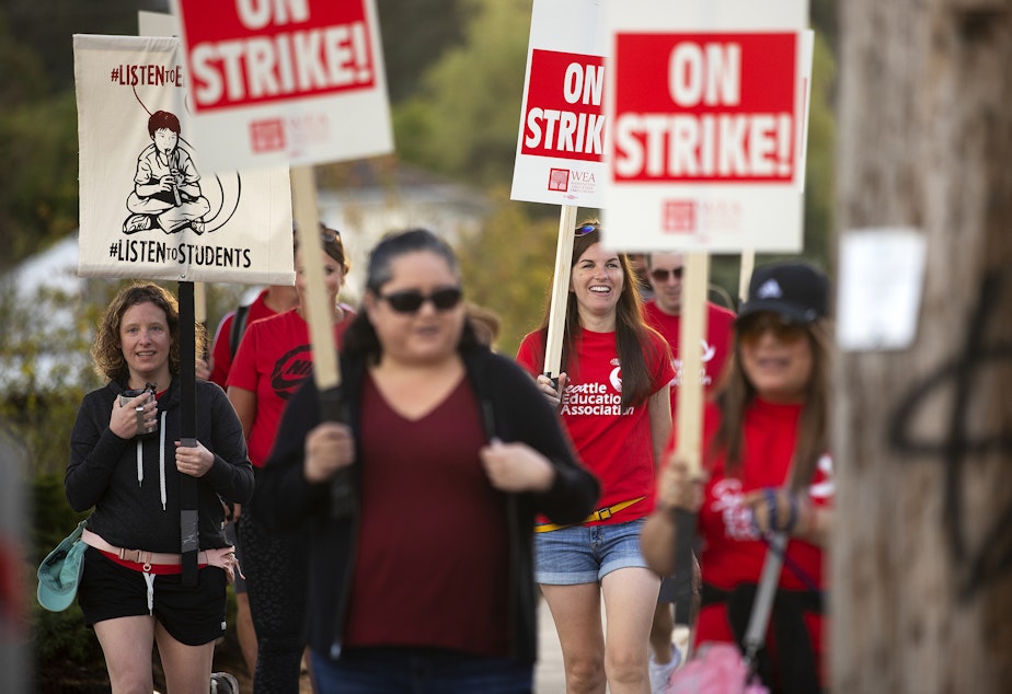 caption: Educators from Robert Eagle Staff middle school picket on what would have been the first day of school, Wednesday, September 7, 2022, along North 90th Street in Seattle. 