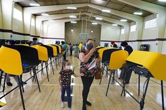 caption: Voters cast their ballots Election Day in 2020 in East Los Angeles. Smartmatic says it's the only county they were operating in for the presidential election, but Fox News mentioned the company 137 times in a month afterward as President Trump and his allies pressed baseless claims of a rigged election.