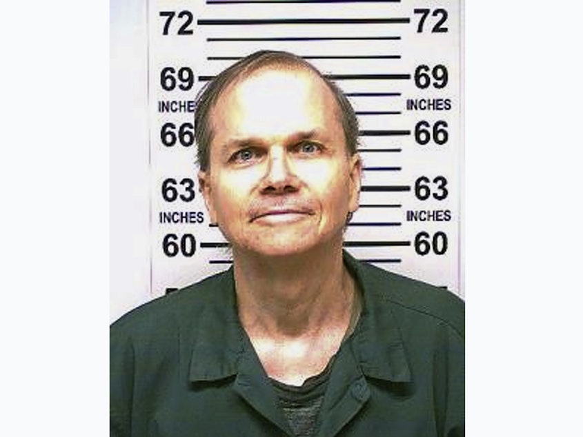 caption: Mark David Chapman, shown in this 2018 photo, shot and killed John Lennon outside his Manhattan apartment building in 1980. Chapman was denied parole for the 12th time in August.