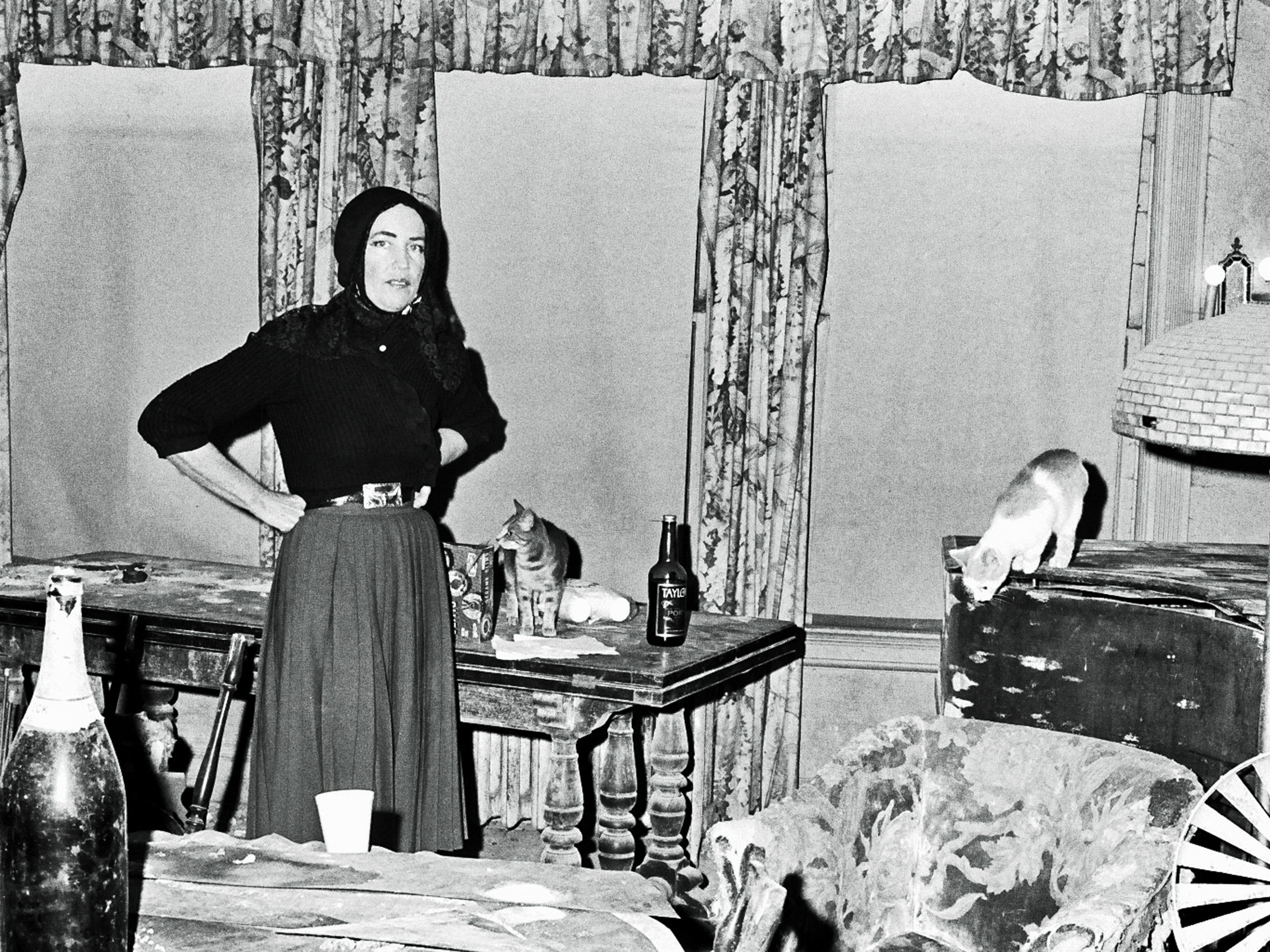 caption: Edith Bouvier Beale at her home "Grey Gardens" in January 1972 in New York. A 1975 documentary by that name explores the reclusive lives of Beale and her mother, living in their dilapidated house with over 50 cats.